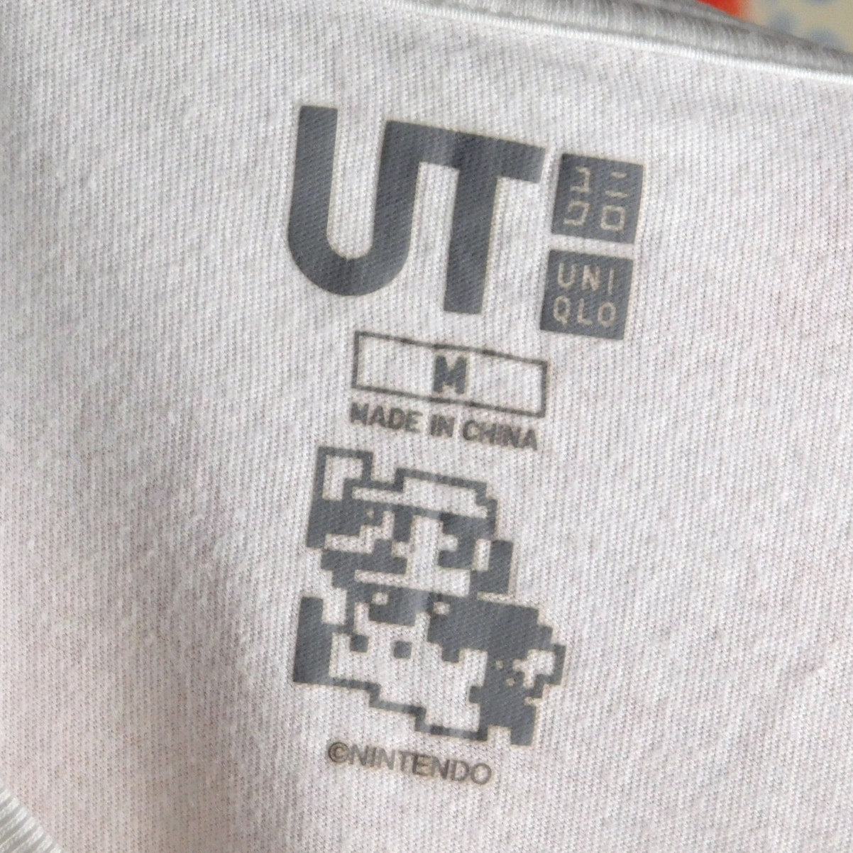 Uniqlo UT Mario Bros Boo Pocket Tee - Size M